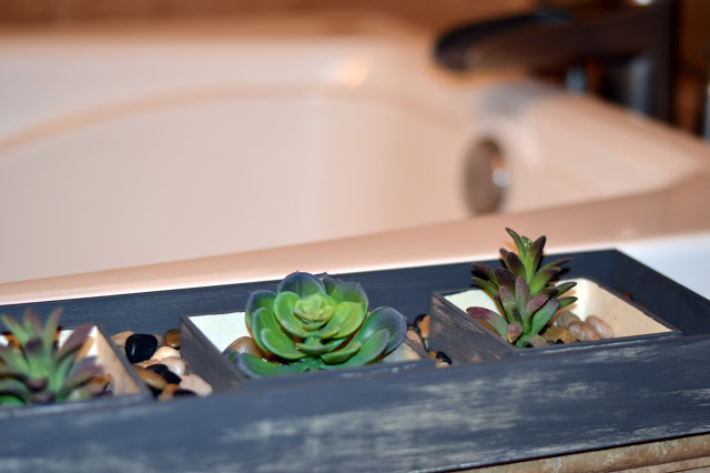succulents in a wooden box used in a spa like bathroom spa bathroom decorating