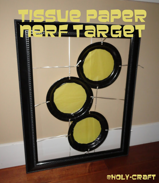using tissue paper and plates to create Nerf target practice for a Nerf birthday party Nerf birthday party