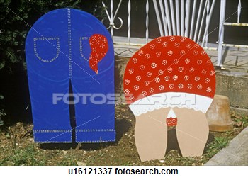 Picture - cutout lawn ornaments 
of rear ends of 
couple gardening. 
fotosearch - search 
stock photos, 
pictures, wall 
murals, images, 
and photo clipart
