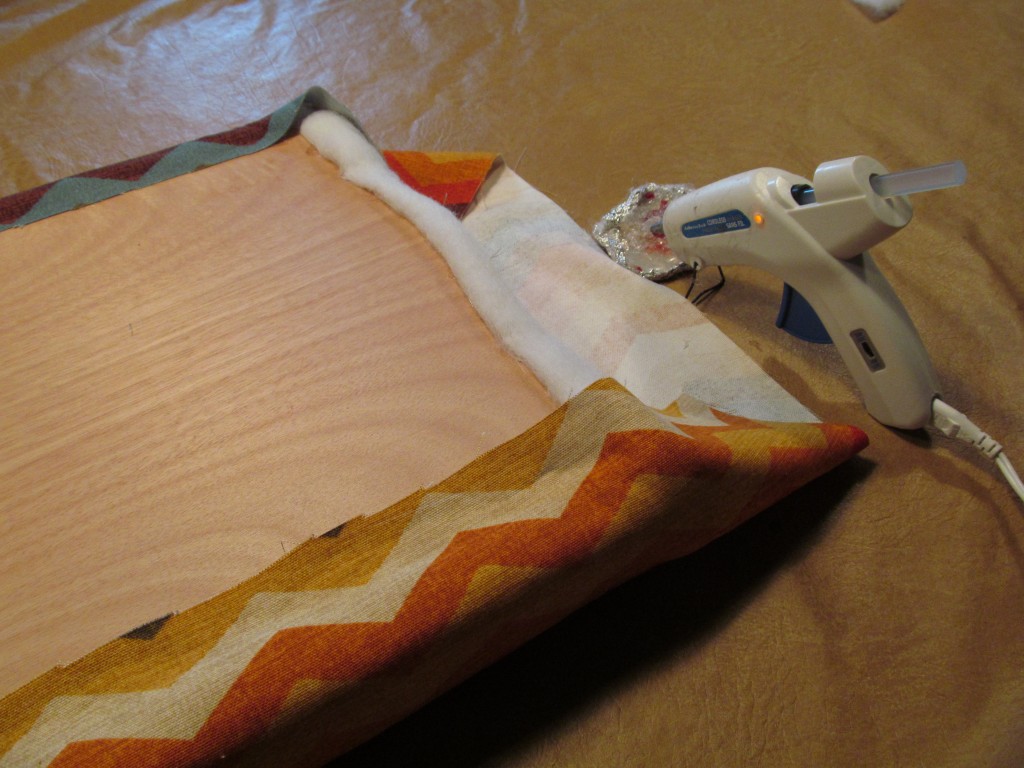 Fabric wrapped around foam and attached to plywood Fabric wrapped around foam and attached to plywood